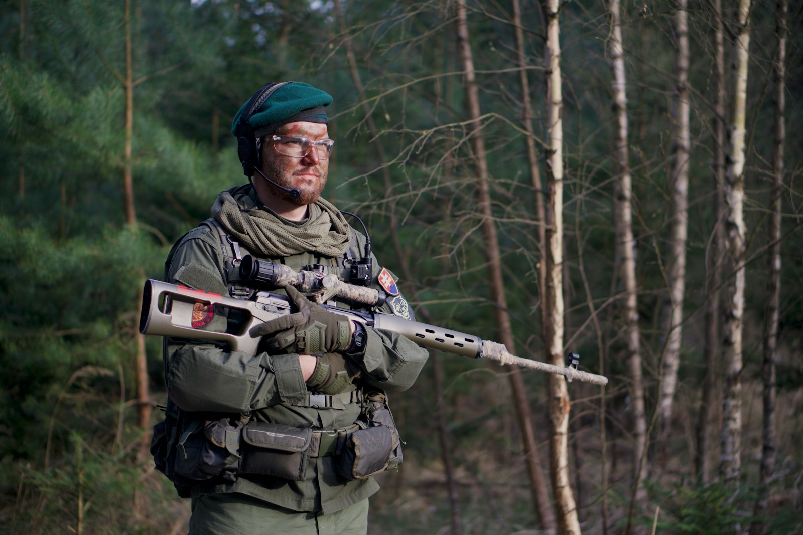 soldier man holding assault rifle standing