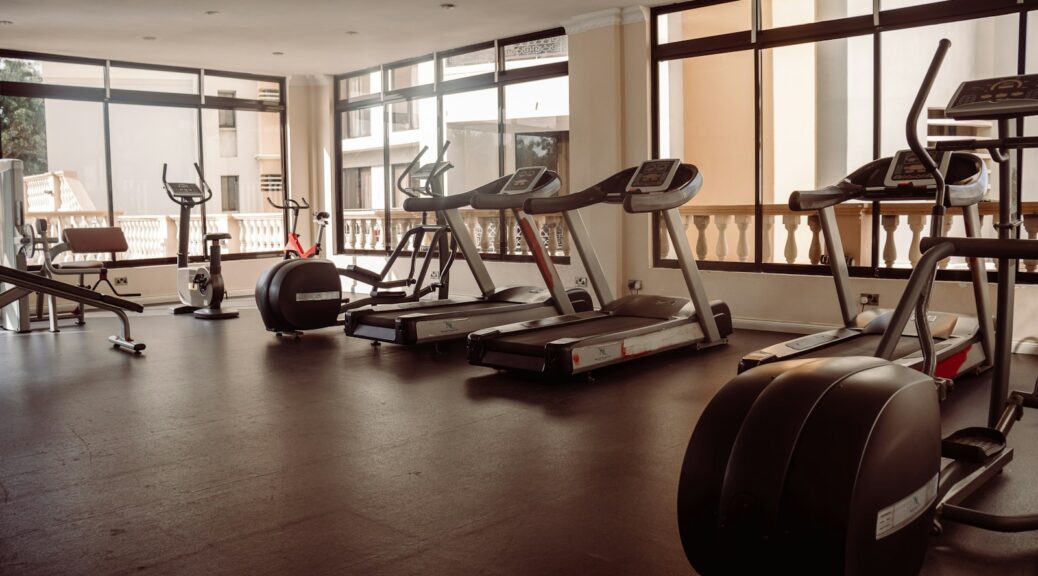 a gym with treadmills and exercise machines